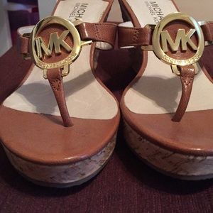 Worn once MK wedge size 7